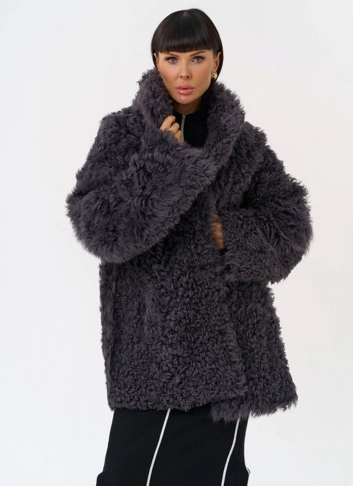 Женская двухсторонняя дубленка с декоративным поясом